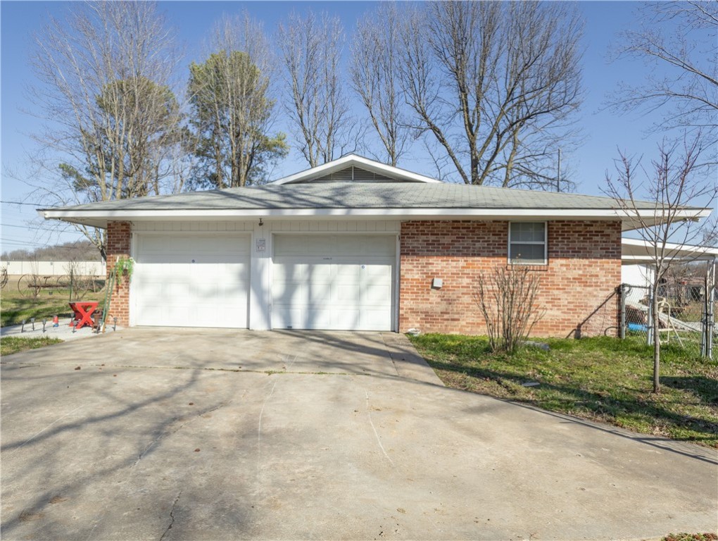 This 1.5-acre property, located near downtown Springdale, offers exceptional potential for future development. While currently zoned for agriculture, it is surrounded by industrial, commercial, and multifamily properties, making it an ideal candidate for redevelopment. The existing home on the site can be utilized for office space, with several sheds and outbuildings offering additional storage or workspace options. With its prime location and surrounding growth, this property provides a unique opportunity for businesses looking to expand or invest in the area. Recent upgrades include-2 new toilets and lines, new stove, new dishwasher, new sink and garbage disposal, new water line, new gas line, new 100 amp electric box. -All new upgrades within last 7 months.