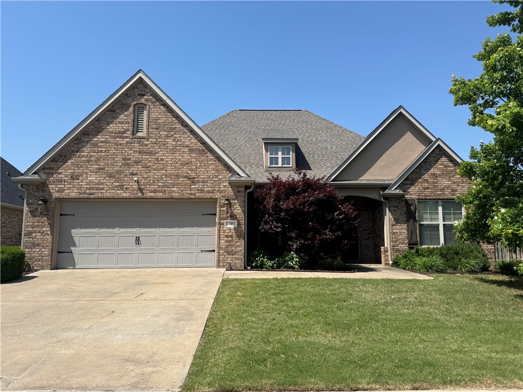 Discover the convenience of this well-appointed 3-bedroom, 2.5-bathroom home situated in a prime Rogers location. Just a short walk to Rogers High School and within minutes of top shopping and dining at Pinnacle Hills Promenade and Pleasant Grove. Downtown Rogers is an easy 4-mile drive away. This 2,225 sq ft property offers plenty of functional space, including a dedicated home office, formal dining area, and a storm shelter for added security. The main living areas feature stunning 12-foot ceilings and warm hardwood flooring. Additional highlights include a central vacuum system, walk-in pantry, half bath, and a separate laundry room. Recently refreshed with a full interior paint. Out back, enjoy the inviting 12x30 stone patio shaded by a pergola—pre-wired with a TV mount, making it ideal for outdoor lounging or game day gatherings.
