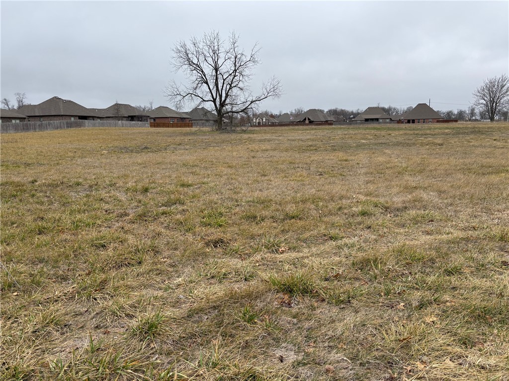 Perfect location offering 2.51 acres on Reginal Airport RD. The land gas great potential connecting Bentonville to the NXA Regional Airport. The property is less than a mile from a future Walmart store and a mile from the Walmart Distribution Center. The land will put you right in the middle of a vibrant and growing area with several residential development. Jump into the opportunity to invest in a growing market. Close to the North Folk and New Buffington Subdivisions. Water and Sewer on property.
