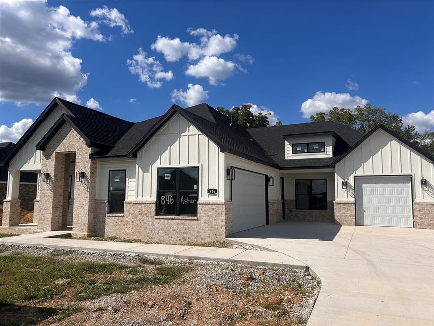 Exquisite Eliana plan - 4 Bedroom, with a Study and also a fabulous Tech center, 3.5 Bathroom and a 3 Car Garage!  Side covered patio off the kitchen nook area as well as a large back patio! 
Luxurious Bedroom One with a fabulous en suite bathroom with a Walk-in Shower and Soaking Tub.  Kitchen boasts cabinet to ceiling cabinets, quartz counters, farmhouse sink and Kitchen Aid Stainless Steel Appliances with double ovens!  Black fixtures! LED Lighting! Ceiling fans!!  Mix of Brick and Hardie board exterior per plan. Asher's Ranch is an idyllic community nestled in the heart of Goshen, Arkansas, known for its picturesque landscapes and serene surroundings. The community boasts meticulously designed and built homes that are situated on expansive lots, with ample space for outdoor activities, gardening, and privacy. The homes are crafted to perfection, featuring modern amenities and elegant finishes that exude luxury and comfort. Come to Asher's Ranch and find your dream home today! Taxes TBD.