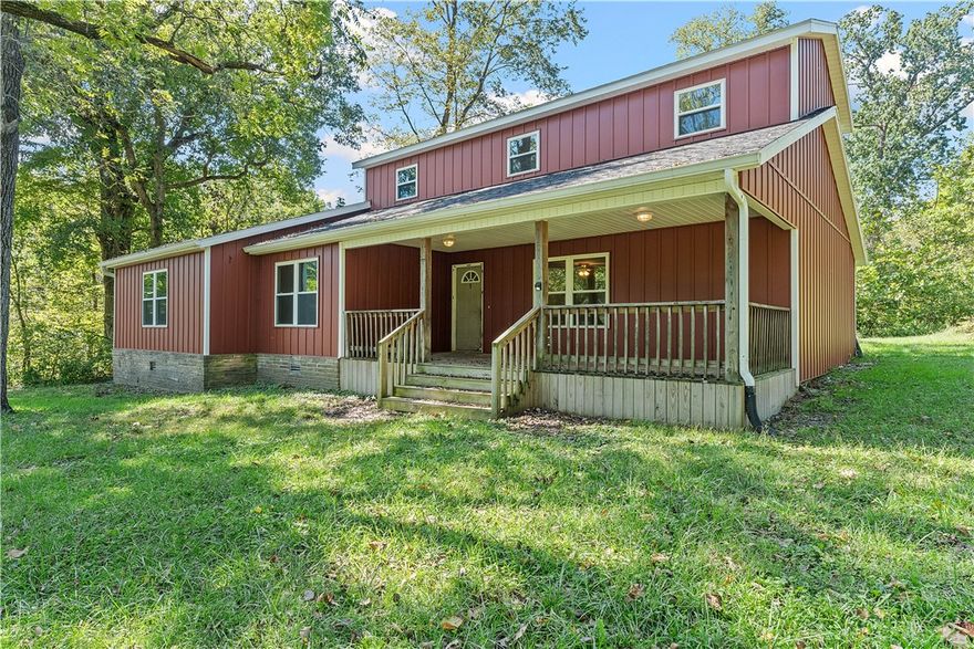 With just over 4 private acres, this spacious 4-bedroom, 3-bathroom home offers a rare opportunity to own a peaceful retreat with endless potential close to Beaver Lake. Surrounded by nature, the property provides privacy, located just minutes from downtown Rogers, Beaver Lake, and all that Northwest Arkansas has to offer. Inside, you’ll find a generous floor plan with room to spread out, making it ideal for families, hobbyists, or anyone seeking extra space. With a little TLC, this home can be transformed into a stunning country haven. The land itself is a true highlight, quiet, wooded, and secluded, yet accessible, ready for gardens, trails, or simply enjoying the serene Arkansas outdoors.  Turn right out of the driveway and you'll end up at a place to enjoy the lake scenery in less than 5 minutes. If you’ve been looking for a property where you can put your personal touch into both the home and the land, this might be the one you've been waiting for.  Inspection Report Available upon request