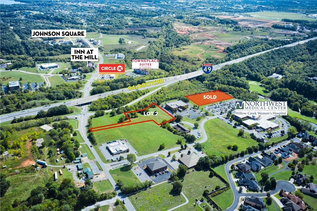 Prime acreage for sale within minutes of Fayetteville & Springdale with I-49 visibility. Nearby businesses include Willow Creek Women's Hospital & NW Medical Center ER, Collier Drugstores, Townplace Suites, Arvest Ballpark, & many more. Johnson is an up-and-coming area for NWA with lots of commercial development & residential growth. Zoned Town Center. Water & sewer is located west of property at street.