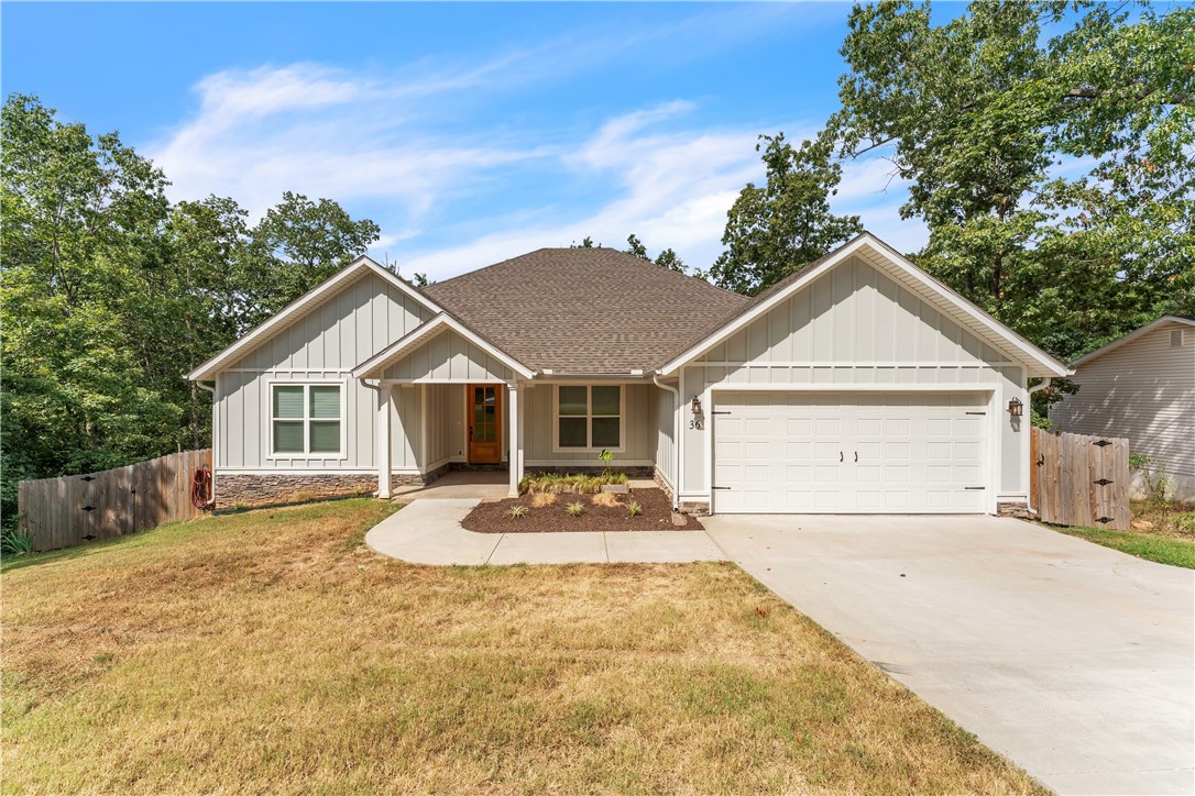 This rare 4-bedroom plus office, 3-bath home is perfectly located only 10 minutes to Bentonville with quick highway access. Inside, enjoy an open floor plan with quartz counters, wood flooring, gas fireplace and range, plus a spacious master suite with soaking tub, walk-in shower, and large closet.
Relax on the covered back patio with wooded views, and take advantage of Bella Vista’s incredible trail access—the Back 40, Little Sugar, and the paved Razorback Greenway are all nearby.
Outdoor enthusiasts will love the unmatched access to Bella Vista’s trail networks. From the nearby Back 40 and Little Sugar mountain bike trails to the paved Razorback Greenway leading south to Bentonville and beyond adventure is always close to home.