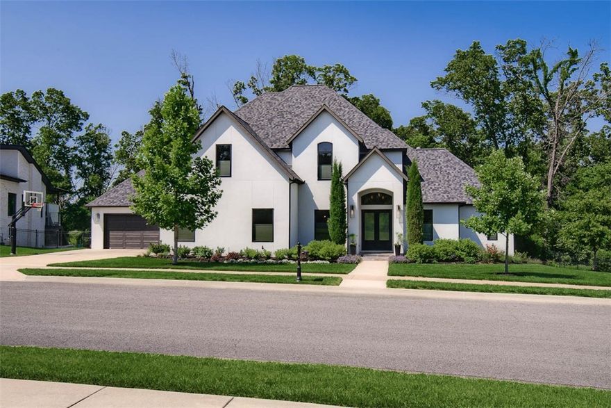 This Stunning, 5 Bed, 4 1/2 Bath Custom, Offers a Captivating Blend of UpMarket Quality, Sophisticated Modern Design & Effortless Living in the Warm Embrace of a Soul-Soothing, Private Nature’s Retreat. Adding to a luxurious .72 acres, 3.96 acres of Protected Greenway directly behind add to the Abundant Privacy.  Designed for Lavish Entertaining & Daily Enjoyment the Gourmet Kitchen Offers a 6 burner gas stove & double ovens, Premium Quartzite Countertops & a Brilliant Hidden Pantry. The Primary, Spa-inspired Suite features a Soaking Tub & Roomy Shower Encased in Seamless Glass. Two full bedrooms on Main Level, Office & another Full-Size Bath w/ Outdoor Poolside Access Add to the Extravagant Simplicity of Refined Design. Upstairs: 3 spacious bedrooms, 2 full baths & Media Room outfitted w/built-in projector & 120” screen. Outside: Covered Patio & Cozy Fireplace along w/ Built-in Outdoor Kitchen & Heated, Saltwater Pool. This Gorgeous home is a Carefully Curated Sanctuary for Resort-style Living at its Finest!