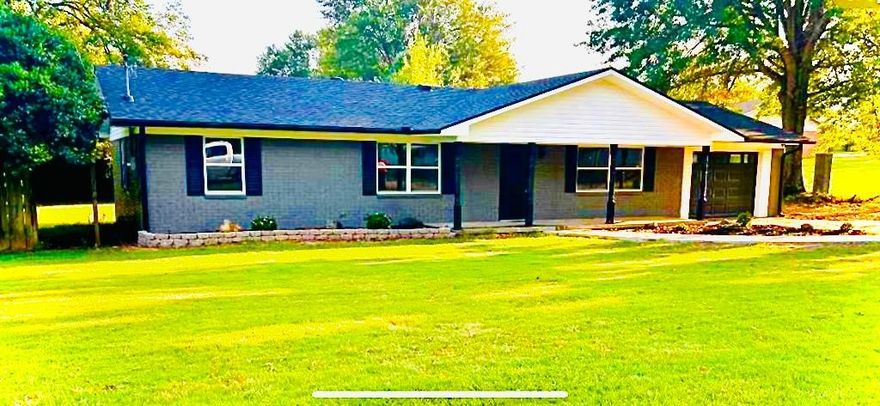 Fully Remodeled from the Studs Up! 
Welcome home to this beautifully renovated 3 bedroom, 2 bathroom property in the heart of Ozark, featuring 1,476 square feet of living space. Every detail has been thoughtfully updated, offering the feel of a brand-new home with modern finishes throughout. The kitchen boasts granite countertops, a subway tile backsplash, and updated cabinetry with built in pantry, while the home also features new, beautifully designed bathrooms. Major improvements include a new roof, HVAC system, and water heater, giving you peace of mind for years to come.

The open layout provides a bright, inviting space perfect for entertaining or everyday living. Outside, enjoy a spacious yard with plenty of room to relax, garden, or play. Conveniently located within walking distance to Ozark Jr. High and Upper Elementary, and less than one mile to Arkansas Tech University, plus close to shopping and everything Ozark has to offer, this move-in ready home is a rare find.

Schedule your showing today!