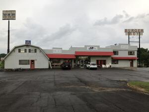 perfect location for high traffic business. On hwy 7N in front of Motel 6. Next to Cj's Burgers, best burger in Arkansas. Building in good condition. Currently a retail business specializing in Antique Furniture and original oil paintings.