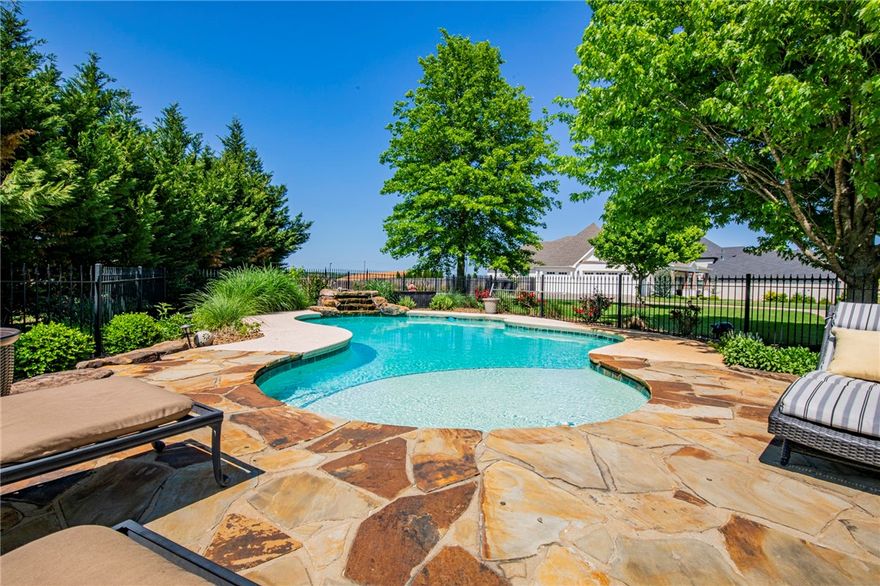 If views could kill! This Shadow Valley home sits on over half an acre with stunning views of the golf course and Osage Creek—within walking distance to Osage Creek park and even comes with a golf membership!
This 4,419 square foot, custom built home with award winning landscaping is a must see. Enjoy a spacious 4 bedrooms, 4 bathrooms, large bonus room, and office. 
If convenience is king, you’ll love this home’s 2 laundry rooms—one on the main level and one upstairs! 
Stunning pool provides an oasis to entertain and relax all summer long.