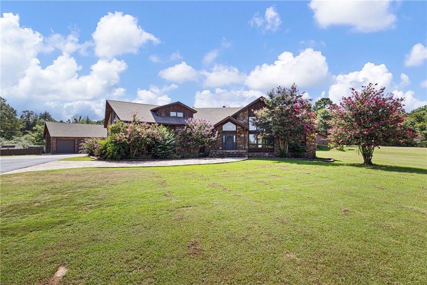 Impressive Custom-Built Estate on 20 Acres with private pond, pool, and dog breeding kennel! Wishing you could escape to your own private paradise? This breathtaking 5-bedroom, 4-bath custom home nestled on 20 pristine acres of countryside is your chance to do just that! Crafted from rich wood siding and rock, this one-of-a-kind residence offers timeless charm, luxurious comfort, and space to live, work, and play. Located in a quiet rural setting, yet close to modern conveniences. Two Fireplaces offer cozy living spaces. In-Ground Swimming Pool provides your summer oasis! Large private pond and 3-Car Detached Garage with plenty of room for toys and tools! There's also a 3,840Sq Ft Metal Building professionally outfitted as a top-tier dog breeding kennel with all the amenities! Room to roam, garden, ride, and enjoy nature in every direction...Pella windows and new roof 2023. Red iron steel kennel may be converted to a barndominium.