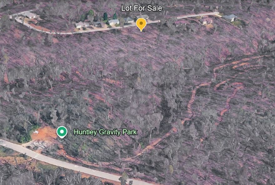 Prime building opportunity in Bella Vista, just minutes from Huntley Gravity Park (Huntley Gravity Zone) in the popular Little Sugar trail system. This lot offers the perfect setting to build your home or investment in one of Northwest Arkansas’s most sought-after outdoor communities. Enjoy immediate access to thrilling mountain bike trails featuring berms, jumps, and flowy lines designed for all skill levels. Bella Vista’s extensive trail network, scenic lakes, and golf courses are at your doorstep, while downtown Bentonville - with its vibrant dining, shopping, Crystal Bridges Museum, and growing tech scene - is only a short drive away. The gently sloped terrain with mature trees provides natural beauty and privacy, ideal for a variety of custom home designs. Located in the highly regarded Bentonville School District. Don’t miss this exceptional chance to own a slice of Bella Vista’s active lifestyle paradise. Refer to listing supplements for survey and successful perc results. Adjacent lot available separately.