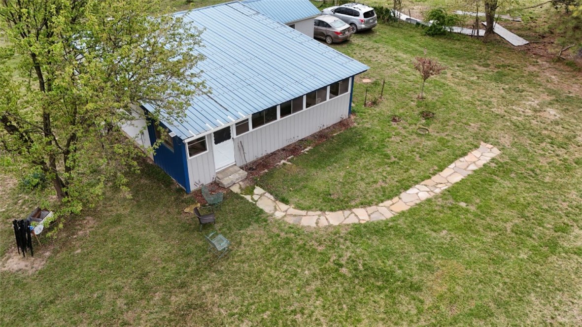 Country Living at its best! Completely renovated home, this rural property sits on 3.25 level acres just outside city limits of Oak Grove. Great starter home offers open pasture at the front and more can be easily cleared to the side and back. Out buildings, cross fenced , Metal Roof, huge enclosed porch, updated electric and a new Well in 2021 Don't miss this opportunity, call for your appointment today!