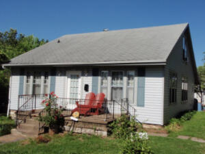Home is being sold ''as is, where is''. All contents are included with sale. Property includes small guest house that is 2 bedroom 1 bath. Home is 4 bedroom 1 1/2 baths. Centrally located to shopping, the park, and rec center.