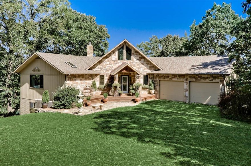 Gorgeous Beaver Lake Views! End of road privacy at this beautiful lake home. Private road leads to your own private boat dock with 30' slip, storage locker, and swim platform. Open living/kitchen/dining with vaulted tongue and groove ceiling, stone wood burning fireplace, and large window to admire the view. Granite counter tops and stainless appliances including a double oven. Large master bedroom with spa like en suite. Second living space downstairs also has stone wood burning fireplace. Plenty of outdoor living space with 2 patios and large wood deck that is partially covered.