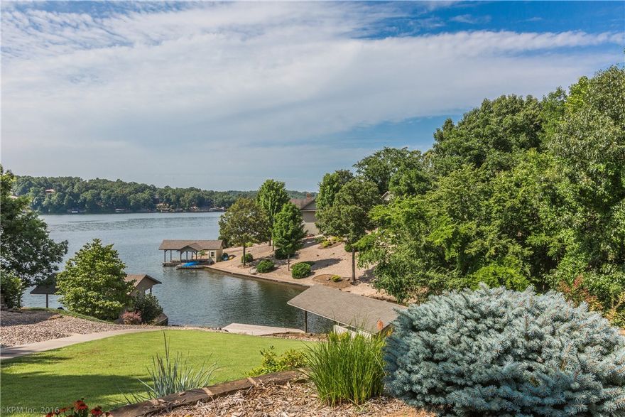 Fabulous Bella Vista lakefront home on Loch Lomond. Wonderfull views from every room. Quality built O.A.K. custom home with the finest of everything and a view from every room. This home is immaculate and needs nothing, gorgeous landscaping highlights the lake views. Boat house and swim deck for lots of lake fun. Also at your fingertips are 3 Country Clubs, 6-18 holes of golf. Lots of Pools, Tennis Courts, are just a few of the amenities for your enjoyment.