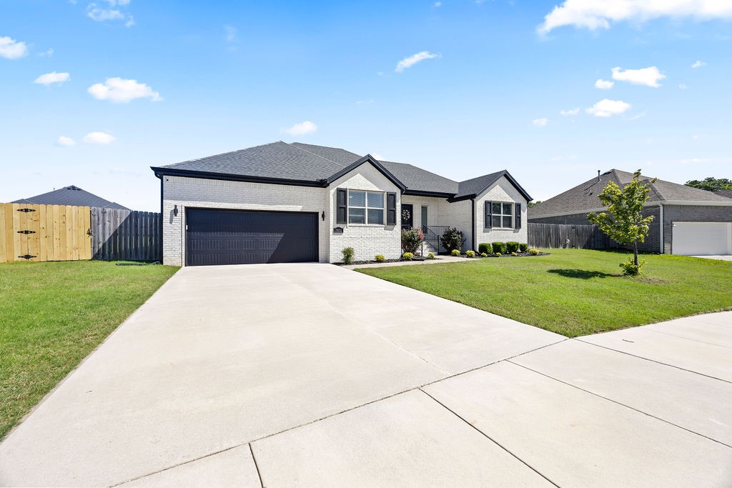 Experience elevated living in this elegantly designed open-concept home, nestled in a pristine, family-friendly community with seamless access to Northwest Arkansas’s finest attractions. Featuring 4 bedrooms, 2 bathrooms, and 1,851 Sq Ft of refined living space on a sprawling 0.34-acre lot—the largest in the neighborhood. Sophisticated upgrades include quartz countertops, bidets, custom accent walls, designer blinds, a premium security system, and a cozy gas fireplace. Step outside to a fully fenced backyard oasis with a stylish gazebo, spacious patio, and fire pit—perfect for entertaining or relaxing. A generous two-car garage with a Level 2 EV charger adds modern convenience. Just minutes from the U of A, top medical centers, trails, and parks. Looking for a smart investment? Ideal tenants are already in place, offering immediate income with no downtime. Luxury, lifestyle, and opportunity—wrapped into one. A rare blend of luxury, comfort, and possibilities await.