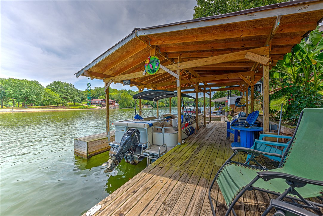 Welcome to your dream lakefront retreat on the serene shores of Lake Windsor! This spectacular property boasts a myriad of features that will enchant you from the moment you arrive. With 3 bedrooms & 2.5 bathrooms, this home offers ample space for comfortable living and entertaining. Includes a boat dock with a sauna room. Enjoy three outdoor decks, a renovated primary bathroom & half bathroom, newer roof, and fresh interior & exterior paint. The home also offers new tile in the laundry room and a new sliding door in the primary bedroom. Stay cozy with two fireplaces. For those with culinary inclinations, this property offers not just one, but two full kitchens! This fantastic feature opens up exciting possibilities, from creating a mother-in-law suite with its own private kitchen to using the lower level for an Airbnb opportunity, making this home as versatile as it is enticing. Don't miss the chance to own this lakefront oasis, where tranquility, modern comforts, & endless possibilities converge.