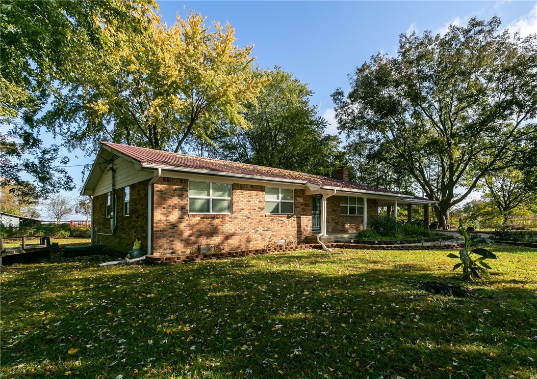 Great location for this ideal gentleman's farm.Lovely remodeled home featuring bamboo flooring, stacked stone wood burning fireplace w/insert, septic system & lateral lines 2 years old, several out buildings & so much more.It's great for livestock, a garden, or just take in the country setting, while still being close enough to town.Insulated storage building 12 X 12, a barn and a 20 X 30 quonset with painted concrete floor & electric add to this gem.This property has so much to offer, don't miss out.