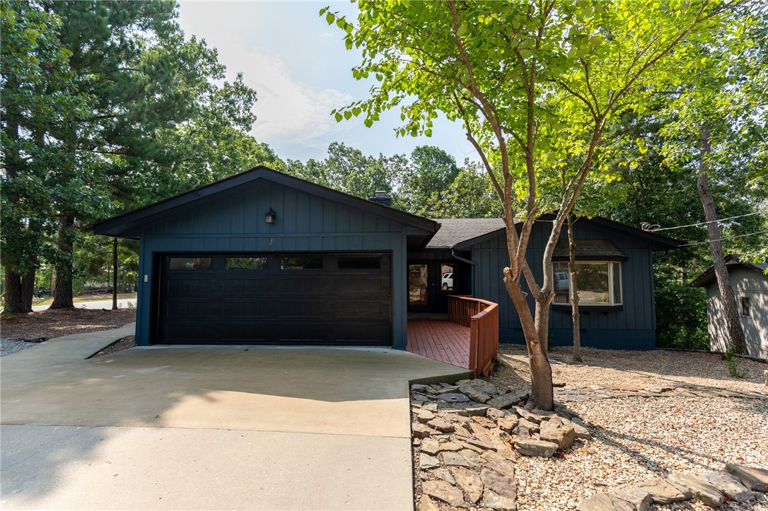 COMPLETELY REMODELED HOME INSIDE & OUT!! Open floor plan, Huge Living area with the original stone fireplace that has gotten a facelift!When you lay eyes on the gorgeous sunroom filled with natural light and serene views you will never want to leave! Bonus room downstairs with a Reading Nook and Half Bathroom. Master Bathroom is equipped with up-to-date Custom tile shower and his/her vanity sinks. Beautiful Modern Light fixtures throughout with Matte Black Cabinet Hardware and Quartzite countertops in the kitchen to top it off! Close proximity to Tanyard Creek and Trais, Interstate, Bike/Hiking , Rec Centers, Golf Courses, and Lakes!