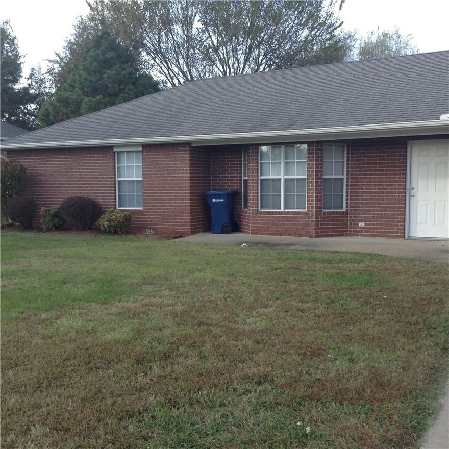 duplex in convenient location. close to park. new carpet and paint. 3 bedrooms two bath.  open floor plan. comes with range and dishwasher.  hook up for washer/dryer.  lawn care provided.