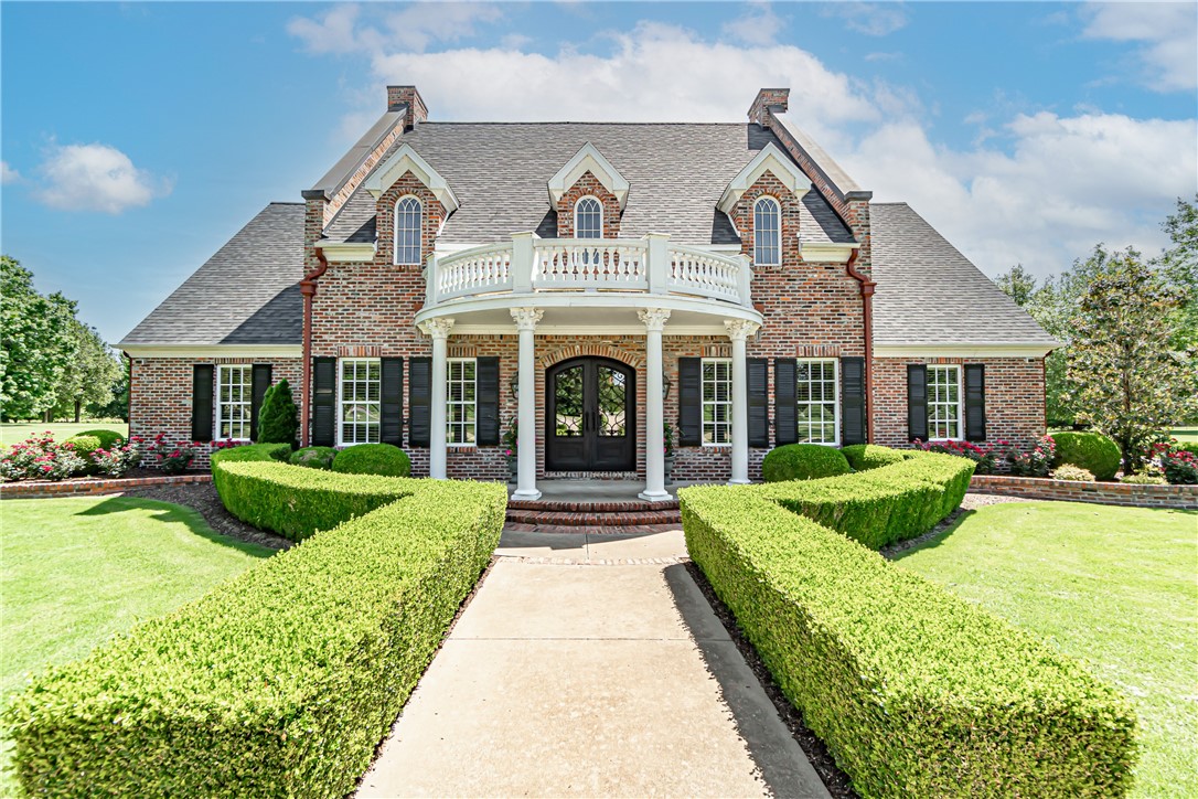 This well designed 5,768 sqft home rests on 2 manicured acres in one of NWA’s premiere gated subdivisions. Featuring top-of-the-line appliances w/ a built-in refrigerator, tankless water heater, the open concept kitchen/living area is perfect for hosting large groups. All 4 Bedrooms have private ensuite bathrooms to go along with 2 half baths,office/study, workout room(5th bedroom), butler’s pantry, extended 3-car garage and bonus room that goes on for days. Don’t forget the private indoor spa off the master bedroom to help you relax after a long day no matter the season. At this price located close to the University of Arkansas in ultra desired East Fayetteville, this property won’t last long