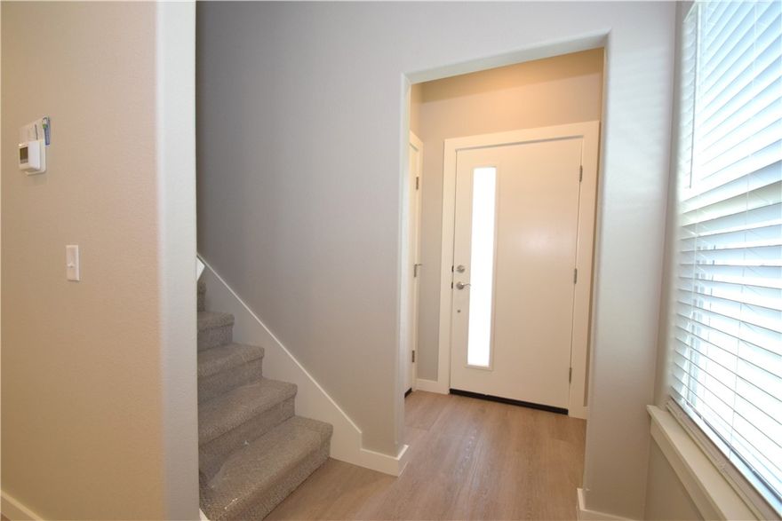 This brand new modern design duplex in the heart of Bentonville! Also included brand new refrigerator, washer and dryer. This 3 bed 2 1/2 bath plan has quartz countertops, stainless appliances, and large pantry. Primary bedroom is on the main floor and has walk-in closet. Two bedrooms upstairs with full bath and walk-in closets. Luxury vinyl plank flooring throughout, 2" faux wood blinds, and upstairs study nook. You even have a private covered back patio and privacy fence. The property is within walking distance to Bentonville Creekside Park, it has a regulation size cricket field, pickleball courts, evening-lit dog park, splash pad, playground and recreation space with a group pavilion. You are also minutes from schools, Bentonville activity center, downtown Bentonville and all that Bentonville has to offer. Owner must approve pets and no smoking.