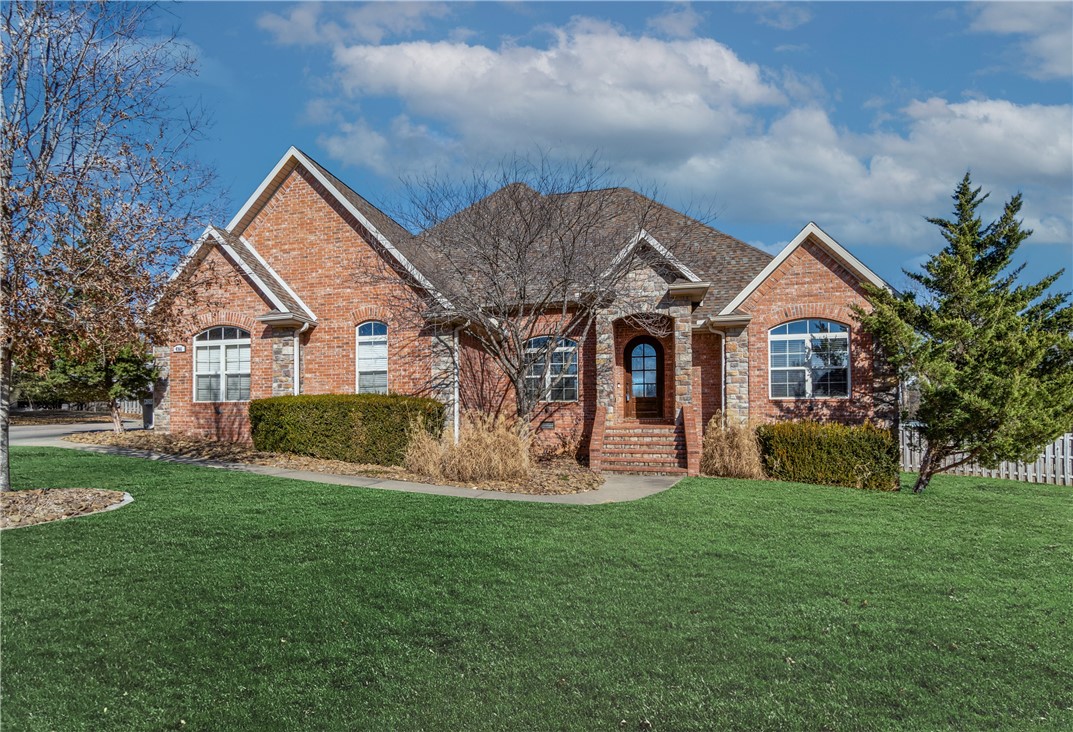 This spacious home offers a welcoming open floor plan, highlighted by cathedral ceilings and stunning wood beams that add character and warmth throughout. The hardwood floors lead into a large kitchen perfect for cooking and entertaining. The master suite provides a peaceful retreat, with a generously sized ensuite featuring separate vanities, a soaking tub, and a walk-in closet that offers ample storage. With a three-car garage, there's plenty of space for additional storage or hobbies. Situated on a large lot at the end of a quiet cul-de-sac, the fenced backyard and covered deck make for ideal spaces to entertain or simply unwind. Plus, you're just moments away from community amenities like tennis courts and a swimming pool, making it easy to enjoy an active lifestyle.