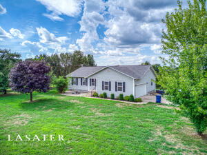 Check out this freshly remodeled 3BR/2BA home in Omaha, AR sitting on almost 2 acres and in a FANTASTIC location! Nestled on a paved road between Harrison, AR & Branson, MO and it's only a short drive to either Table Rock or Bull Shoals Lakes! Sporting a modern layout with a split-floor plan & an open concept, this would be a fantastic starter home! New flooring throughout the home, along with new windows, new doors and a newer roof (2018)! Kitchen boasts Hardwood cabinets & all appliances will convey! Large & newly refinished deck off of the dining room makes for a perfect place to chill & grill while overlooking your large & level backyard!