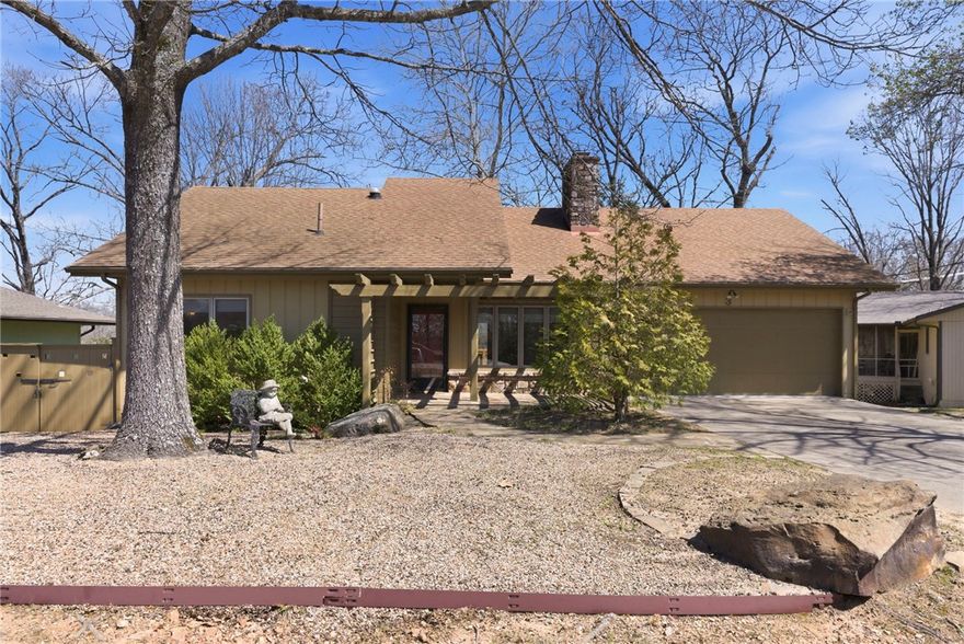 The Kensington Neighborhood is located right between the new state-of-the-art  Bike-Lift and Lake Windsor.  One of Bella Vista's most desirable areas.  This exceptional 2 bedroom home is located steps away from the "Landline Bike Trail" -  Yes, location is important from an investment standpoint. However, when you walk in this home you will immediately forget everything outside.  Updated to the max with quality everywhere.  From the hardwood floors, custom tile counters and backsplash, new appliances, fresh cabinet paint.  The attention to detail can be seen in features such as the venetians blinds, tiled bathroom showers, stone fireplace mantle and new outdoor decks and steps.  This is not a weekend flip, these improvements were made by the current owner over time with extreme care and thought.   Seller is relocating to be nearer family.  Treat yourself to this well kept, very special home.