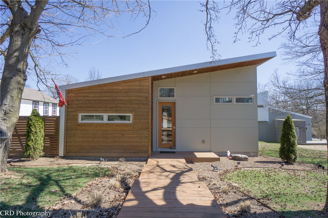 SOUTH FAY Skiles Architect, PA designed PASSIVE SOLAR home with abundance of upgrades. 2 BR/2 BA +office, split floor plan featured in AY Magazine. Design and execution will delight any homeowner w/elevated ceilings, abundant windows & restrained material palette making the home feel more expansive. The design incorporates the scale of the neighborhood & efficiency of space to create a small, site specific home with big impact. Irrigation, professional landscaping, detached 2 car gar & security.