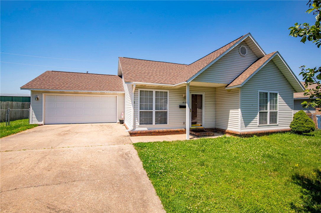 Great starter home in the heart of Gravette. This charming 3 bedroom, 2 bath home has a lot to offer new roof, new walk in master shower and luxury vinyl flooring, also double closets in the master one is a large walk in, split floor plan, covered porches and so much more. Only 2 miles to the high school, easy and convenient to get too. Large eat in kitchen with breakfast bar, great for families on the go, refrigerator conveys, fenced in backyard, you may want to paint and put new flooring in, but totally livable and loved through the years. Don't wait this won't last!!!!