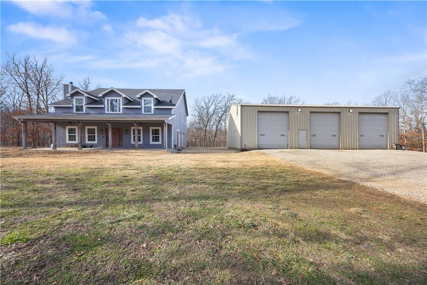 Welcome to the perfect blend of space, functionality, & wide-open country living. This 2,781 sq ft home sits on 3.16 peaceful acres, offering room to breathe, work, & play—indoors & out. The real star of the property is the massive 40x60 shop, ideal for mechanics, hobbyists, or small business owners. The shop is fully insulated, has a propane heater, 3-12x14 bay doors, full bath & a 2 post lift that could be negotiated into the sale! Inside the home, you’ll find generous living areas designed for comfort & everyday living, w/plenty of room for family, guests, or entertaining. The master suite has new carpet, huge walk-in shower, large corner tub, & tons of closet space. The kitchen offers all stainless steel appliances & the island has a custom Black Walnut Island Top w/Merlow Red Epoxy River from Ol Loggin Sawmill here in Gravette! Fresh Paint in Jan 2026, including walls, doors, & trim & the staircase is freshly stained. All the tile, grout, & carpet were professional cleaned making this 100% move in ready!