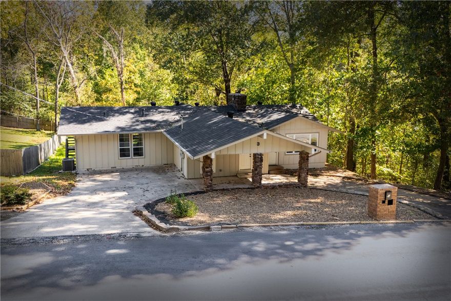 Completely renovated and move-in ready, this home offers modern comfort in an unbeatable location—just two blocks from the Tunnel Vision Trail. Every detail has been refreshed, with new walls, paint, flooring, carpet, cabinets, and fixtures throughout. The spacious living room features exposed beams and a new electric fireplace, while the kitchen shines with 3 cm countertops, new appliances, and a temperature-sensitive faucet. The primary suite feels like a spa, showcasing a rain shower with six body jets, motion lighting, and lighted mirrors. Step outside to a fully rebuilt deck with direct access from every bedroom—perfect for morning coffee or relaxing evenings. With new HVAC, windows, sliding doors, recessed lighting, fans, and an upgraded exterior, this home combines thoughtful design, comfort, and style in one impressive package.