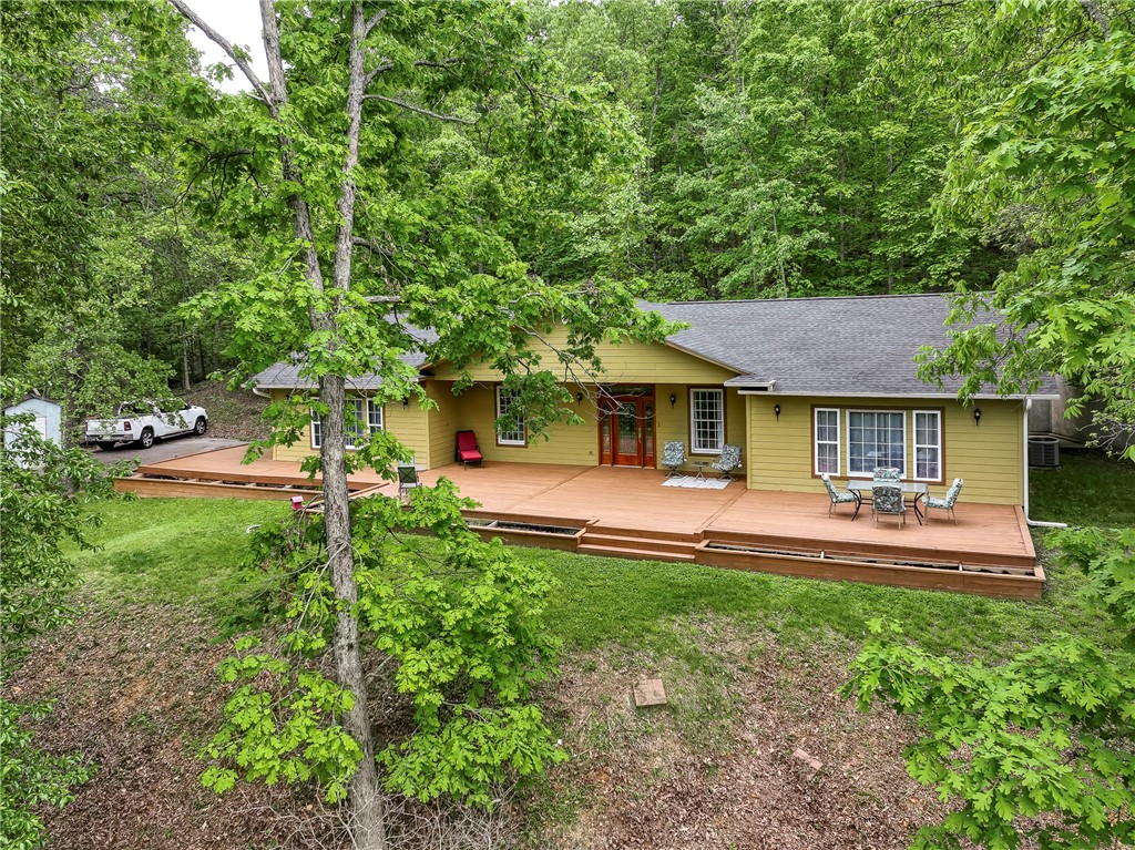 Perched above the valley with a view that doesnāt get old, this home starts strong with a brand-new kitchen and a front deck made for slow mornings and laid-back evenings. Step inside to a wide-open flex spaceācurrently home to a pool tableāthatās ready for whatever fits your lifestyle. New HVAC and roof in 2022 take care of the big stuff, and the tankless water heater, water softener, chlorinator, and reverse osmosis system add everyday comfort. Out back, thereās a concrete pad in front ready for your future garage or shop. Come take in the view and see how easy it is to feel at home here.
