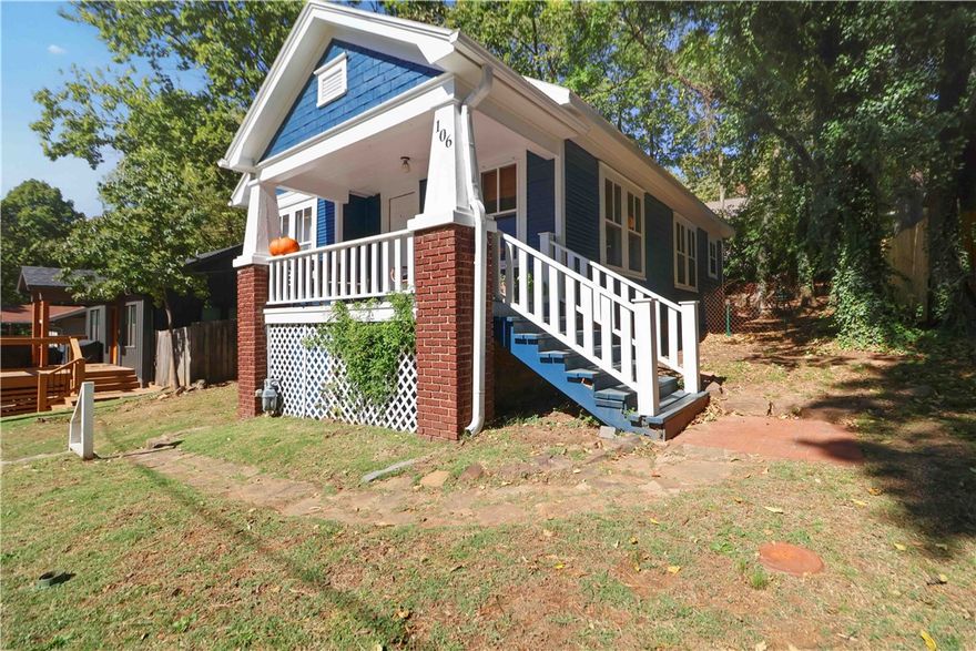 Discover charm and convenience in this adorable 2-bedroom, 1-bathroom home with brand new exterior paint. Perfectly situated just 1 block from Dickson Street and 3 blocks from the downtown square, and walking distance to shopping, dining, scenic walking trails, beautiful parks, and the University of Arkansas! Inside, you'll find hardwood floors throughout the main living areas, with stylish tile flooring in the kitchen and bathroom. Enjoy the abundance of natural light that fills the home, and relax or entertain on the inviting covered front porch. This cozy home blends comfort with an unbeatable location! House has new exterior paint.