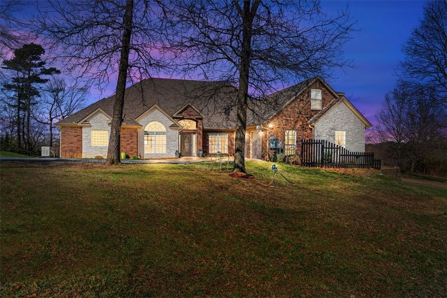 BACK ON MARKET-BUYER FINANCING FELL THRU. PARADISE AWAITS. Beautiful & immaculate custom home on 7.68 acres with no restrictive covenants. 2400 s/f metal shop with 110/220, 3 shop doors, one oversized for RV storage. Sellers invested $200k+ on updates since 2022. Please review the amenities portfolio and survey for full details. 3 bedrooms + 3 full baths + home office & 387 sq/ft bonus room over garage - could be 5 bedrooms. New roof & HVAC, whole house generator, surge protector, & water purifier system. 4'x6' tornado shelter, 1200 lb safe, 2 frigs, gas grill & freezer convey. Beautiful western views from covered patio and pool. Both eat-in kitchen and formal dining off living room. Fenced zen garden on side of home. Oaks, maples, pines, dogwoods, redbuds & flowering bushes. Small community of luxury homes with acreage - quiet and safe, nice neighbors too! Property is located between Rogers and Eureka, 1 mi south of Beaver Lake for fishing and water recreation. Also near Hobbs State Park and War Eagle Mill.