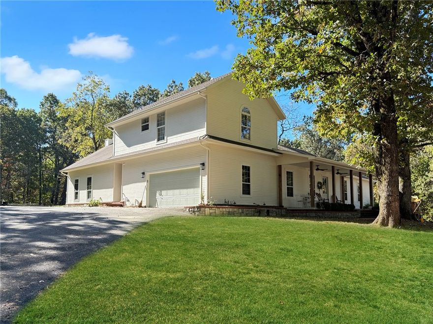 Price Reduced! Motivated Seller. Now includes additional 3.5 acres for a total of 17 Acres. This cottage homestead style 2908 SF home has been recently remodeled. Wooded, secluded, peaceful but close to town. Overlooks 17 acres with stunning views and a live spring. Conveniently located right off the desirable Wedington Dr. This rare opportunity property features a spring-fed pond for fishing, barn (150 sqft) and shop (120 sqft) building for ample storage, 1485 ft of road frontage (with steel fence) , 20x40 inground pool and pool house for endless summer fun (automatic pool cover included), 600 SF composite deck with outdoor woodburning fireplace for hosting guests, new appliances and water heater, new interior and exterior paint, quartz countertops, water purification system, hand-ripped wood floors, pellet stove in enormous family room,  8x30 front porch for great morning and sunset views, 2-car garage and MORE!! Land generates $900 a month in income.