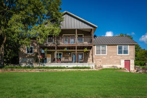 This home was sold with MLS 138939 for a purchase price of $440,000. This home and 4.41 acres has river access. Beautiful home with mixed hardwood floors with concrete floors in kitchen and 2nd living area which is radiant heat in those 2 rooms. Cedar used in home was milled from timber off of the land. Large master with wonderful title shower and a deck to look out on your property. This property is part of MLS 138936