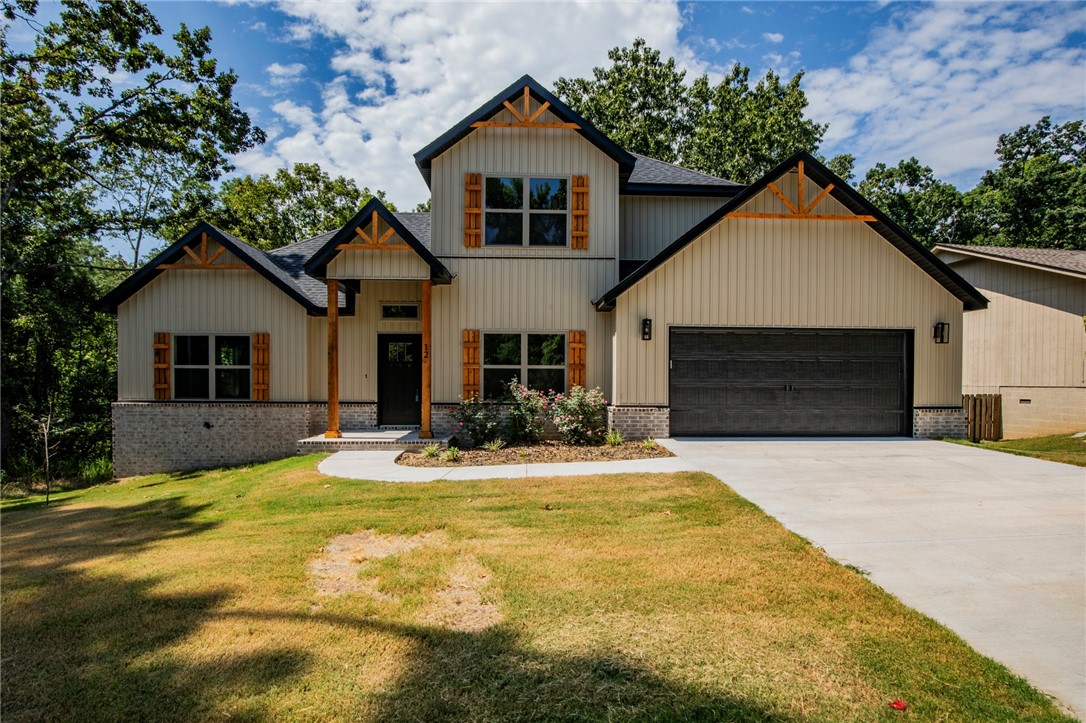 Brand New Bella Vista Beauty near Loch Lomond & Scottsdale Golf Course/Clubhouse! 2 bdrm+OFFICE+BONUS/2.5 bath home sits on a lovely spacious lot- This most popular open concept/split bedroom floorplan boasts lots of natural light with high end quality finishes featuring hardwood floors in living/dining areas, gas log fireplace, custom cabinets, granite countertops, pantry, eat-in kitchen & WIC. Spacious master suite has spa like bath with double vanity, walk-in custom tile shower & soaker tub. Excellent outdoor space with covered deck. Pre-wired for automatic GENERAC generator ($1k value) $0 down payment. 100% financing. Rural development loan. $5000 towards rate buy down or closing costs with builders preferred lenders.