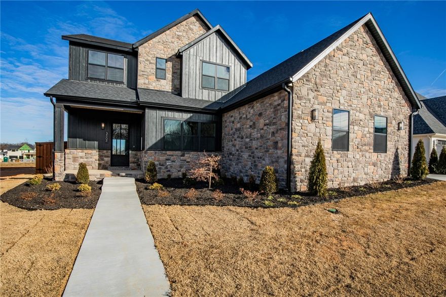 Welcome to the Heartbeat phase of Aurora. This stunning 5-bedroom, 4.5-bath home offers over 3,300 square feet of thoughtfully designed living space with elevated finishes throughout. Soaring ceilings, a spacious open-concept layout, and designer touches create the perfect blend of elegance and livability. Enjoy multiple living areas, including a bonus room, ideal for entertaining or family gatherings. Retreat to the luxurious primary suite, complete with a spa-like bath, while guest rooms and flexible spaces ensure ample space for everyone. Outdoor living shines with a private covered patio and three-car garage, all within one of Bentonville’s most desirable communities.