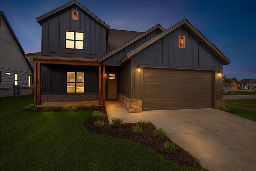 Fabulous new construction near the Promenade and Rogers Aquatic Center!
These elevated homes showcase stunning design with white oak flooring, high-end countertops, and designer tile selections throughout. Vaulted ceilings and floor-to-ceiling cabinetry create a grand, open feel, while the butler’s pantry, with counters and outlets, keeps your gorgeous kitchen clutter-free.
The primary suite is a true retreat, featuring a spa-like bath with a frameless glass shower wrapped in floor-to-ceiling tile, and dual vanities. The spacious walk-in closet offers custom shelving, drawers, and hanging space for ultimate organization. Upstairs, you’ll find three additional bedrooms and a full bath with the same elevated finishes, plus one room easily doubles as a bonus living area.
Outside, enjoy full sod, front landscaping, and a private backyard with a gate and wood privacy fence!