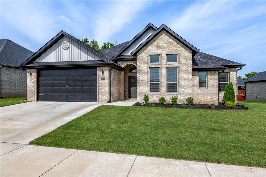 Lives like it's brand new! Compare the value in this home with all that is included: washer,dryer, refrigerator and a shed! (all nearly new) Split plan, with open living and kitchen. Beautiful finishes and meticulously cared for home.  Wood floors in living, kitchen entry & hallways. Impressive "walk thru closet" and large tiled shower in primary suite. This is everything you are looking for!
