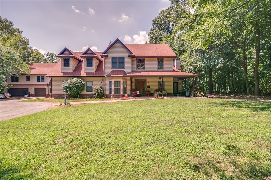 Want country living close to town, then this gorgeous property is just right for your family and a extra garage apartment for in-laws or grown adult children. With 3.5 acres of woods and seclusion this property will give you a sense of peace and quiet. This 5 bedroom, 4 bath home has a saltwater pool that has its own pool house and outdoor shower. Is has a energy efficient geothermal HVAC & a whole house generator that will run everything in case of outages. Must see to appreciate!!!