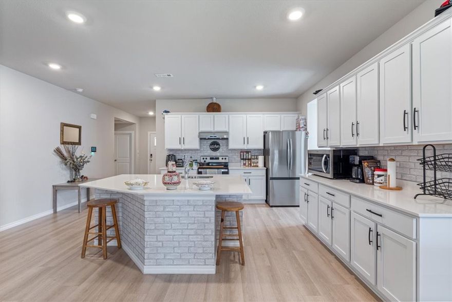 4 spacious bedrooms, 2 full bathrooms, an expansive backyard,This home offers the perfect balance of privacy and accessibility. Owner will take them up on closing, also the back yard has the sewer connected making it perfect for those families that want to have a small trailer in the yard! 

Chicken house can be removed if required by future Home Owners!