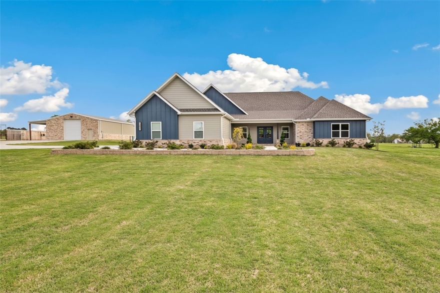 Stunning 1YO custom home featuring 3BR/2BA - 2,930 SF, situated on 10.68 AC m/l of gorgeous countryside. This beautifully designed property offers high-end amenities throughout, incl top-of-the-line appliances, premium fixtures, & upscale flooring to showcase exceptional quality & style. The spacious floor plan is complemented by a large laundry area & a 3-car garage. Step outside to a beautifully landscaped yard w/a full sprinkler system, creating a lush, outdoor setting. Sturdy pipe-fenced pastures w/cross fencing provide excellent functionality for livestock, horses, or rotational grazing. You'll also find an impressive 36x80 insulated shop/barn w/concrete floors & infrared heat. Equestrian enthusiasts will love the two gorgeous horse barns complete w/2-stalls, a tankless HWH & a wash area, making this property ideal for horses. A rare opportunity to own a nearly new home w/luxury features, functional outbuildings, & breathtaking acreage. This is truly a must-see property to fully appreciate all it has to offer!