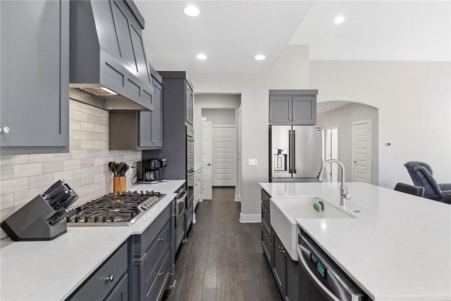 This beautiful home offers the perfect blend of comfort, flexibility & convenience in a highly desirable NWA location. Enjoy easy access to I-49, Walmart campus, the projected Bentonville Health Care Campus, downtown & outdoor recreation, with walkability from the backyard gate. A true standout is the approx. 500 sq ft detached space offering incredible flexibility. This private space features bamboo flooring, a vaulted ceiling, kitchenette & full bath—ideal for a guest suite, studio, home office & more. The open floor plan showcases a gorgeous kitchen with an expanded island, gas range, butler’s pantry & ample storage. Additional highlights include a sprinkler system, natural light & upstairs bonus room ideal for a media or play space. Step outside to a large private backyard with an expanded patio—perfect for entertaining or relaxing. Bike riders will appreciate nearby access to the Traverse Loop bike trail. Homes offering this level of space, versatility & location are a rare find. Don’t miss this opportunity!