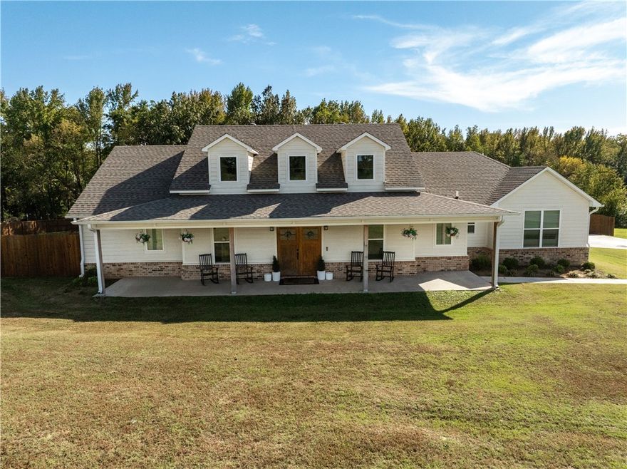 2022-built modern farmhouse on 1.5 picturesque acres just outside Van Buren! This stunning 4-bedroom, 2.5-bath home features timeless country charm with shiplap accents, floating shelves, & abundant natural light. The spacious living room offers vaulted ceilings, custom built-ins, a gas log fireplace, & large windows with serene views. The kitchen boasts shaker cabinetry, quartz countertops, stainless energy-efficient appliances, a farmhouse sink, & a huge walk-in pantry. Relax in the luxurious primary suite with double vanities, a soaking tub, custom tile shower, & an oversized walk-in closet. Additional highlights include an office, extra storage, an oversized laundry room, & an inviting porch perfect for unwinding. Beautifully maintained & move-in ready, enjoy peaceful country living just minutes from town!
