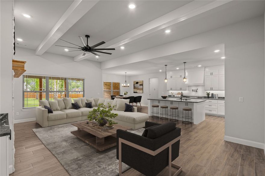 Beautiful, like new home on over 1 Acre in Rogers! This 4 Bedroom home built in 2023 features an office, large outdoor living area, extra storage, & massive bonus room. Open living layout perfect for everyday living and entertaining. Living room with built ins, fireplace, and beamed ceiling. Spacious kitchen with dining area, large island, gas range w/potfiller, double oven, and butler's pantry. Large primary suite with private views, beautiful bath with soaking tub and walk-in shower, WIC connected to laundry. Mud room area with built in storage. 3 guest rooms on opposite side of home, 2 share a large bath w/double vanity, 3rd has private bath. Bonus upstairs has room for everything! Covered patio w/fireplace has ample room for seating, dining & grilling. Your large 1.04AC yard is fully fenced and ready for garden, activities, and more! 3 Car garage offers great storage/workshop space. Whole home water filtration system. Move in ready, Welcome home!