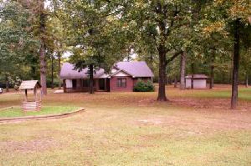 You will enjoy what this home has to offer... 3 bedrooms 2 bathrooms with an open Living, Dining and Kitchen. But you will be spending most of your time on the back deck. A covered cooking area with electric, a raised patio area for eating and covered sitting area with ceiling fans. Inside the home the can lights with dimmers are LED. A 9x12 metal storage building is a plus. See pictures for more!