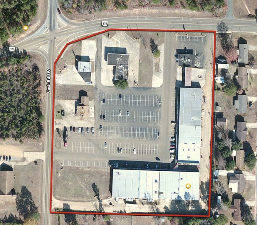 Great Cap Rate! Large retail strip center anchored by regional grocery chain and national tenant with sales percentage bonuses. 59,044 sq ft retail with Laundrymat, car wash, tobacco store,  with long term leases. Additional acreage included for room for expansion with additional stand alone building. New roof in 2012 lots of improvement and plenty of parking.