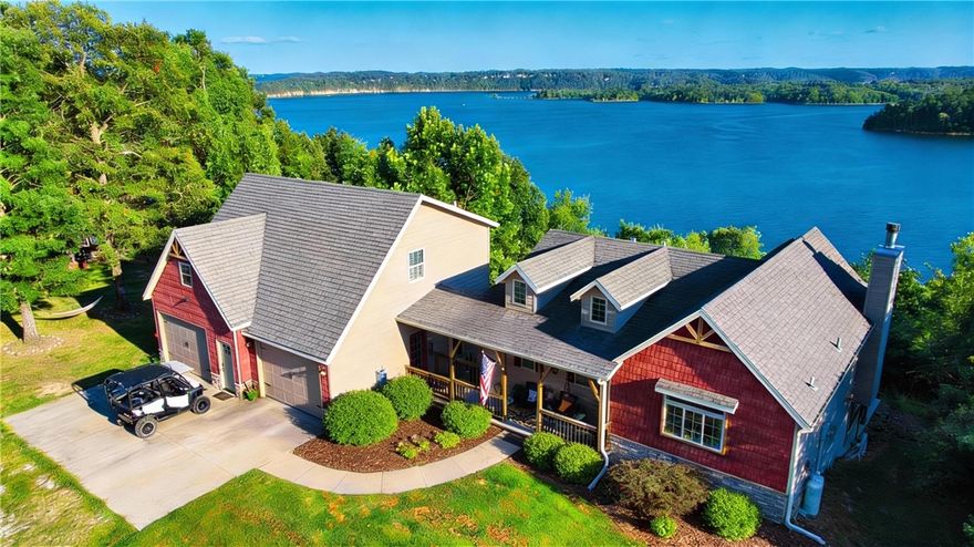The Unicorn of Beaver Lake Living Has Arrived! This is your rare opportunity to own year-round unobstructed views of Beaver Lake, featuring breathtaking sunrises and sunsets right from home. Designed for comfort and connection, the open-concept main house offers inviting living spaces, modern amenities, 3 bedrooms, 3 full baths, and two living areas, perfect for lake life and entertaining. Step outside to a newly expanded 675 sq ft deck, ideal for relaxing while soaking in endless lake scenery. Enjoy easy access to the water with a community dock, swim deck, and a dedicated 24ft boat slip for all your lake adventures. Adding to the rarity is a versatile guest house, perfect for Airbnb, hosting guests, or multi-generational living, complete with a full kitchen, living room, bedroom, and bath. An expansive 3-car garage offers space for vehicles, lake toys, and a workshop. All this just 25 minutes from Downtown Rogers, with no HOA. This is what you're looking for!