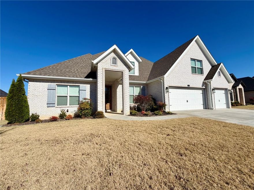 Beautiful home in Bentonville with lots of space and great built ins. Open floor plan with lots of crown molding, hardwood floors through main living area and primary bedroom. Home has formal dining area and eat in kitchen, 4 bedrooms 3 full baths plus a bonus room. Gas fire place in living room. Kitchen includes stainless appliances, built in oven, microwave and gas cooktop , large island with farm sink. Primary bedroom is on main level with large bath, separate soaking tub and large tile shower, exceptionally detailed closet with lots of built ins. 2nd bedroom on main level and full bath. Upstairs 2 bedrooms 1 bath and a bonus room. 3 car garage, fenced yard. All appliances included, washer/dryer, 2 refrigerators and an additional freezer.